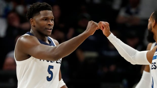 Timberwolves guard Anthony Edwards celebrates after scoring a basket against the Houston Rockets in the third quarter at Target Center.